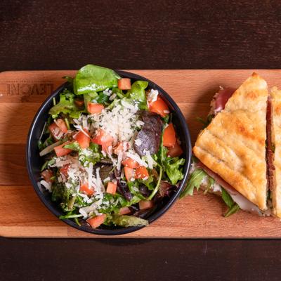 Salad and prosciutto sandwich.