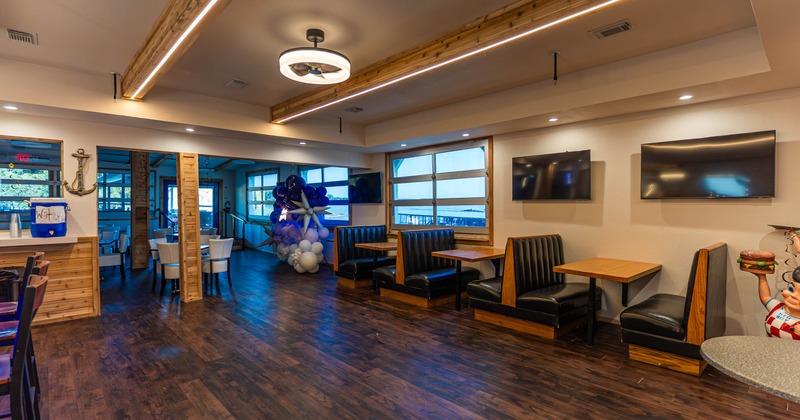 Interior of with booths, decorations and ambient lighting