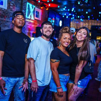 People posing for the camera.