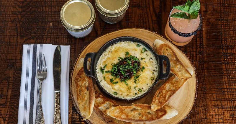 Baked Goat Cheese, with tomato, basil, bacon jam and crostini
