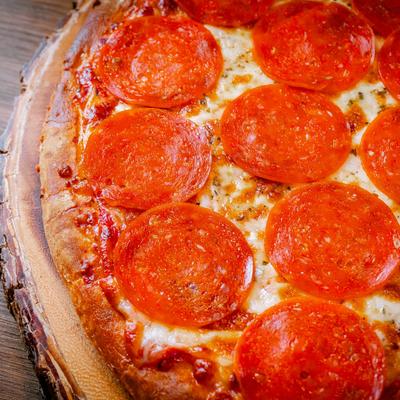 A close up of pepperoni pizza.