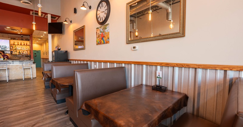 Interior, seating area with booths and tables