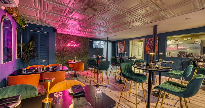 Interior seating area with tables and chairs