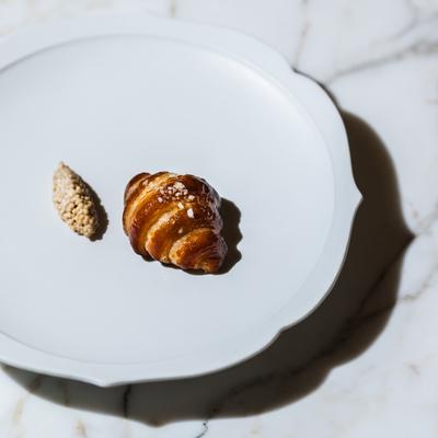 Pretzel Croissant with whole grain mustard on the side.