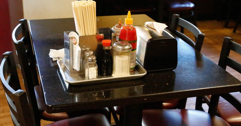 Dining table with condiments