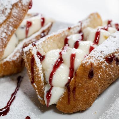 Deep fried dough with creamy filling.