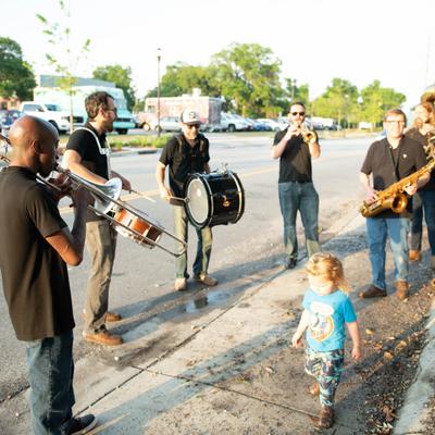 Brass band playing outside.