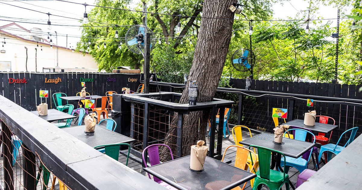 Outdoor terrace with tables and chairs