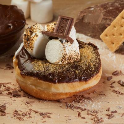 S'mores donut topped with chocolate glaze and toasted marshmallows.