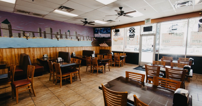 Interior, dining area with entrance in the back