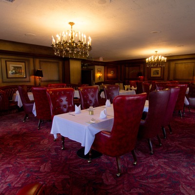 Elegant interior, tables with cutlery.
