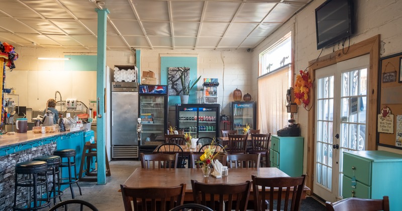Interior with wooden tables and chairs
