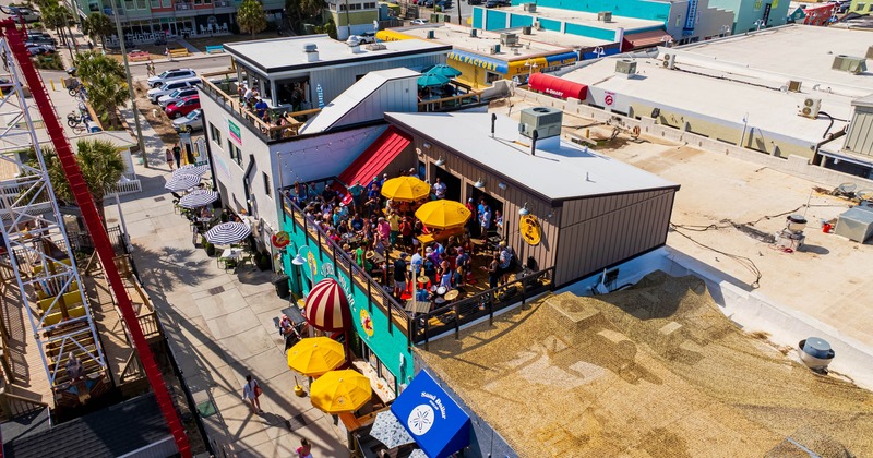 Exterior, party on patio, drone shot