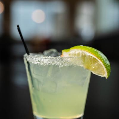 Margarita, decorated with lime wedge.