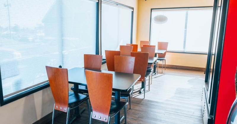 Dining area, tables for four people by the windows