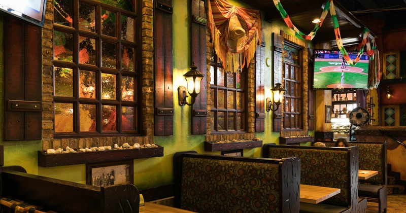 Interior, booths with tables near the wall