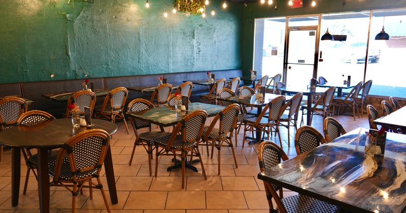 Interior, tables and chairs ready for guests