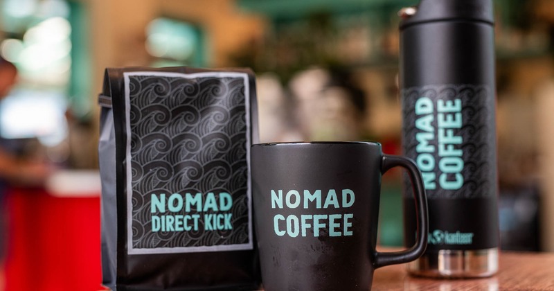 A bag of House coffee and a mug