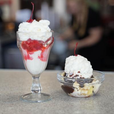 strawberry sundae and a hot fudge cake.