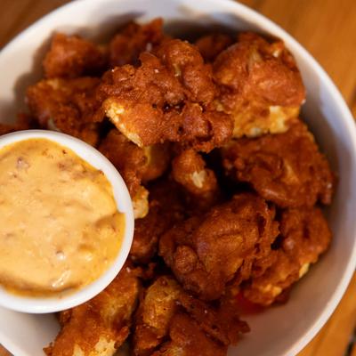 Fried cauliflower bites, with chipotle dip.