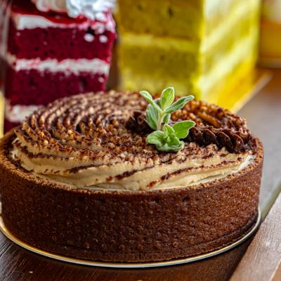 A close-up of a coffee cheesecake or tart.