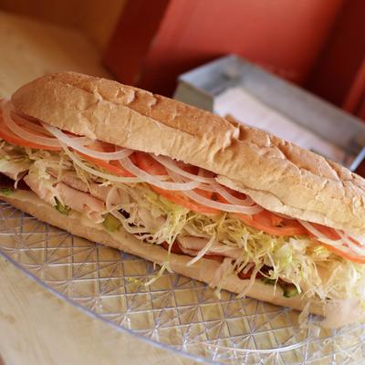 Turkey, Avocado, Bacon and Swiss Sandwich.