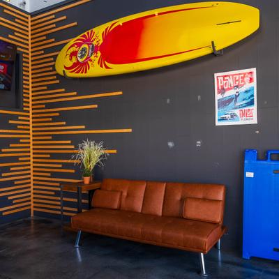 Upholstered sofa and wall decorations.