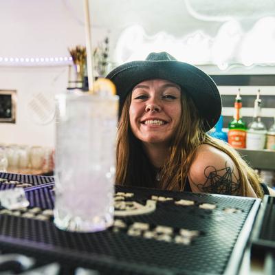 Bartender preparing a cocktail.