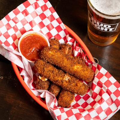 Hand Breaded Cheesy Stix with Marinara.