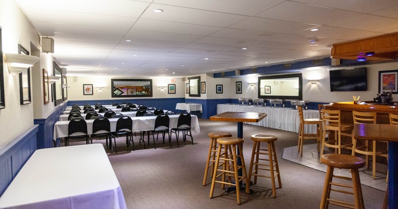 Interior, fiesta room, open space catering area, regular tables, high seating with stools