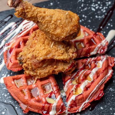 Chicken & Waffles with with butter & warm syrup drizzle.