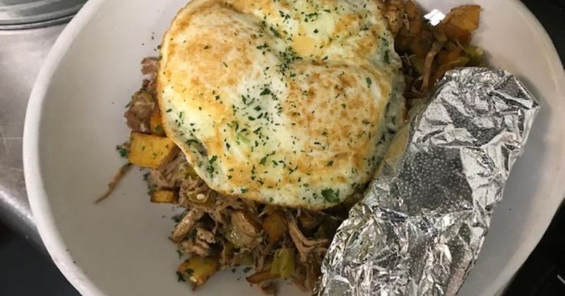 Meat dish with egg on top