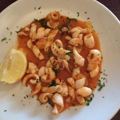 Calamari in light tomato sauce.