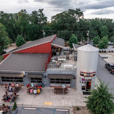 A far view of the outdoor patio and the building.