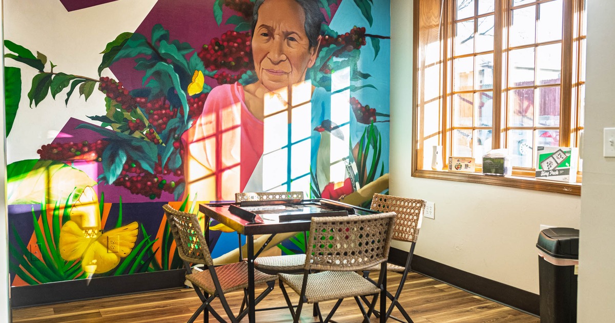 Interior, table for four people, painted wall