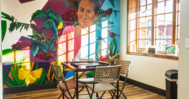 Interior, table for four people, painted wall