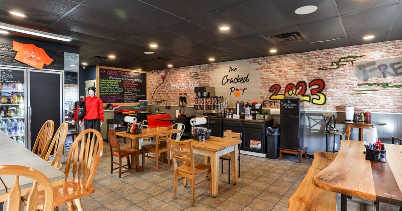 Casual interior dining area with wooden tables