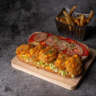 Fried Shrimp Po Boy and fries.