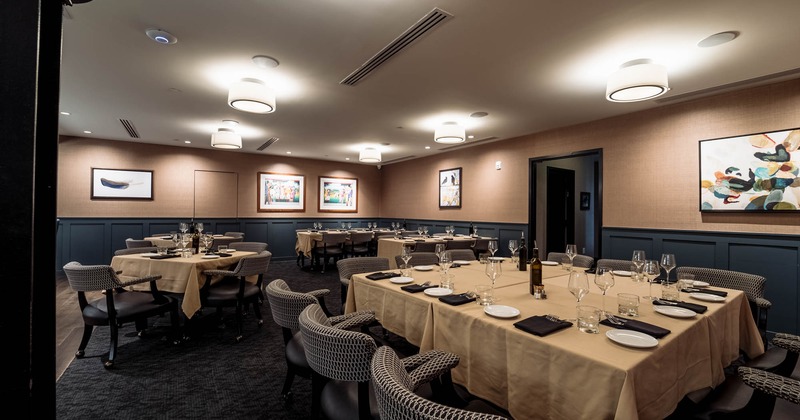 Dining room with tables set for guests