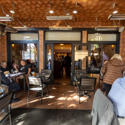 Covered patio, outdoor seating area.
