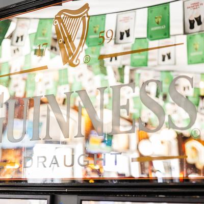 Interior,  a sign for Guinness Draught.