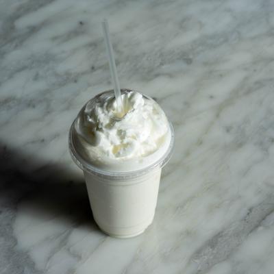 Glass with milkshake.