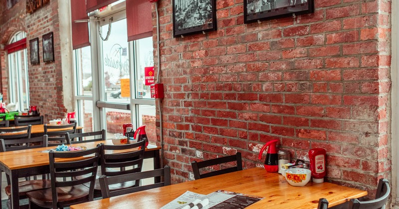 Inside, seating area with wall decorations