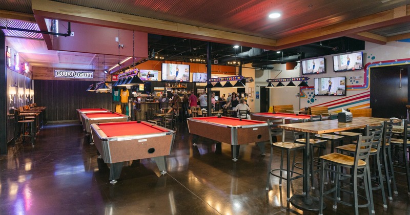 Wide view to pool tables and diner tables