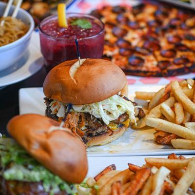 Burgers, pizza, and a cocktail.