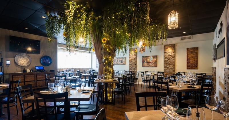 Interior, dining space with lights and decor tree