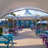 Seating area under frame tents.