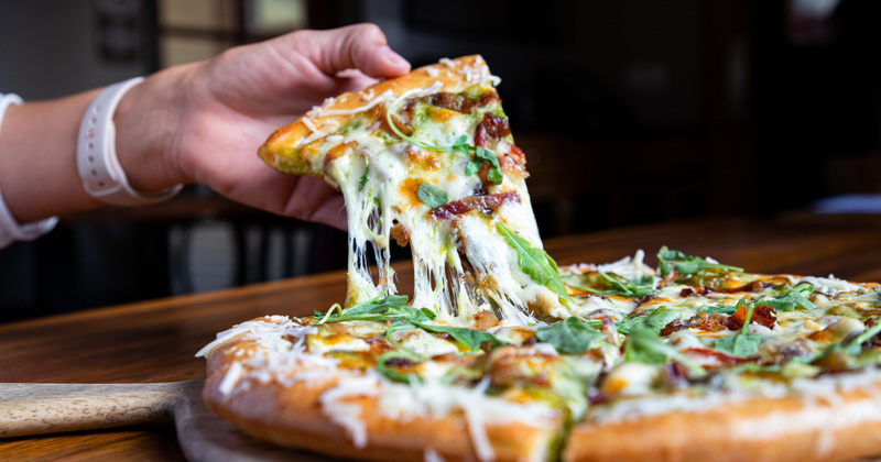 The Date Pizza Dates, Bacon, Arugula Pesto, Smoked Mozzarella, Blue cheese