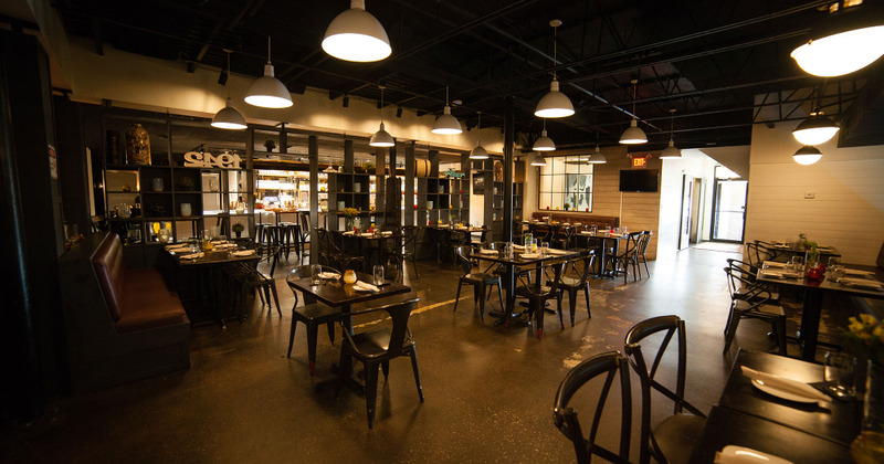 Restaurant interior, tables ready for guests