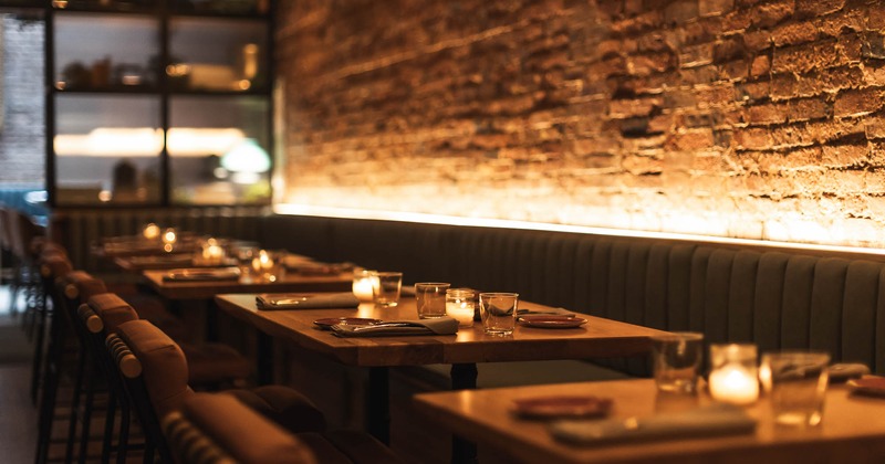 Interior, lined up tables ready for guests